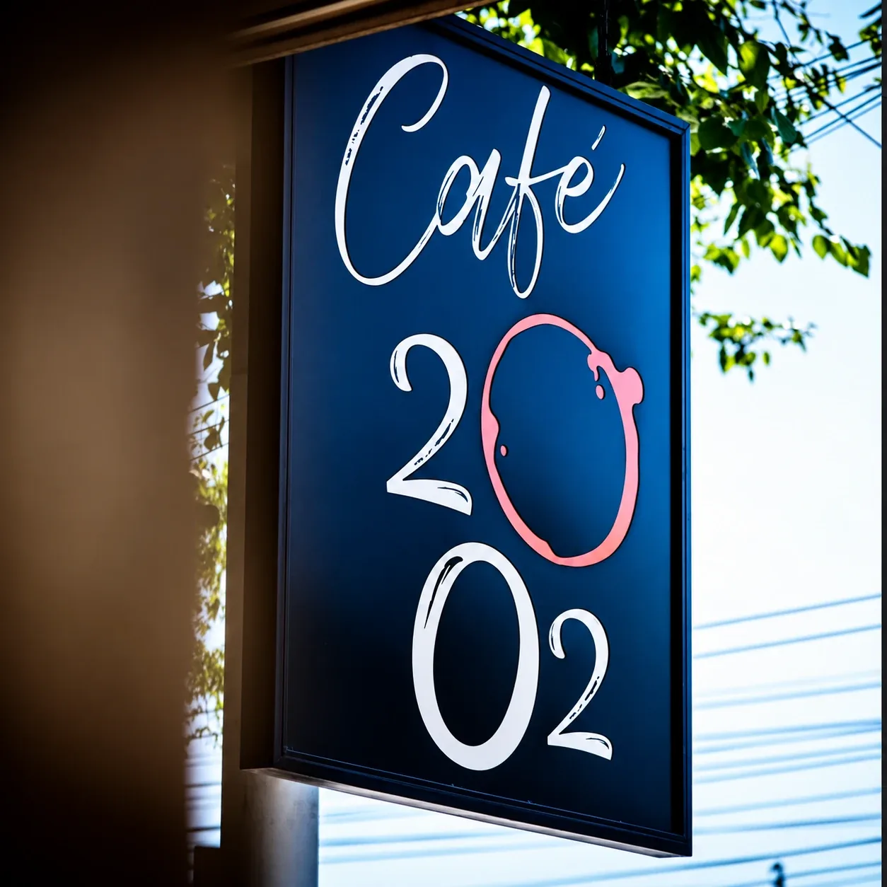 El cartel de Café 20/02